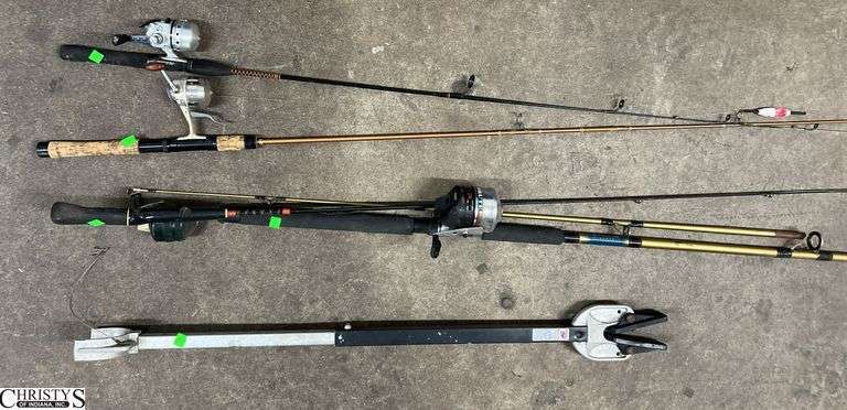 4 Fishing Poles, and Holder image