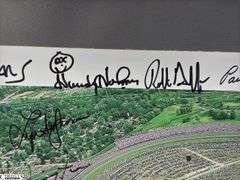 Indianapolis Motor Speedway 40" X 13.5" Areal Photo with Autographs.  Signatures Include Andy Hillenburg, Paul Goldsmith, Johnny Rutherford, DIZ, John Martin, and Many Others.