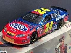 4 Jeff Gordon Collectible Stock Cars - 10" approx of largest