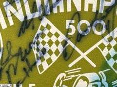 2 Indianapolis Motor Speedway Autographed Pennants.  Signatures include Mark Dismore, Scott Herrington, Lloyd Ruby, Jim Rathmann and Others.