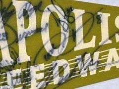 2 Indianapolis Motor Speedway Autographed Pennants.  Signatures include Mark Dismore, Scott Herrington, Lloyd Ruby, Jim Rathmann and Others.