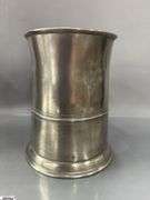 2 Pewter Tankards. Both Marked 'Quart' And Feature A Decorative Handle. One Mug Has GR 329 10 Stamped On It, And The Other Mug Has 1910 Stamped On It.