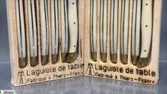 2 Sealed Packs of Laguiole, Dubost of France Ivory and Brass Cap Knives