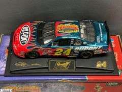 2 Jeff Gordon Collectible Stock Cars - 11" approx of largest