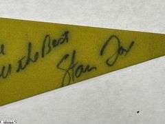 2 Indianapolis Motor Speedway Autographed Pennants.  Signatures include Mark Dismore, Scott Herrington, Lloyd Ruby, Jim Rathmann and Others.