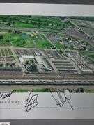 Indianapolis Motor Speedway 40" X 13.5" Areal Photo with Autographs.  Signatures Include Andy Hillenburg, Paul Goldsmith, Johnny Rutherford, DIZ, John Martin, and Many Others.