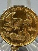 1/2 oz $25 Gold American Eagle Coin in 14K Bezel.