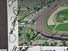 Indianapolis Motor Speedway 40" X 13.5" Areal Photo with Autographs.  Signatures Include Andy Hillenburg, Paul Goldsmith, Johnny Rutherford, DIZ, John Martin, and Many Others.