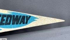 Indianapolis Motor Speedway Autographed Pennant.  Autographs include Lloyd Ruby, Bobby Unser, Tom Carnegie, Lynn St. James, Tom Sneva and Others