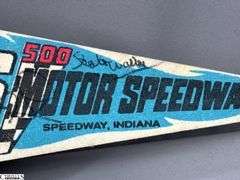 Indianapolis Motor Speedway Autographed Pennant.  Autographs include Lloyd Ruby, Bobby Unser, Tom Carnegie, Lynn St. James, Tom Sneva and Others