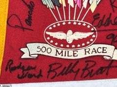 Indianapolis Speedway Autographed Pennant.  Autographs include Jim Nabors, Tom Sneva, Johnny Rutherford, Michael Andretti, Robby Buell, Eddie Cheever, Billy Boat, Rodger Ward, Poncho Carter, Jim Rathmann, Robby Unser, Scott Goodyear and Others