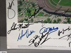 Indianapolis Motor Speedway 40" X 13.5" Areal Photo with Autographs.  Signatures Include Andy Hillenburg, Paul Goldsmith, Johnny Rutherford, DIZ, John Martin, and Many Others.