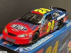 4 Jeff Gordon Collectible Stock Cars - 10" approx of largest