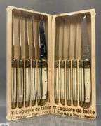 2 Sealed Packs of Laguiole, Dubost of France Ivory and Brass Cap Knives