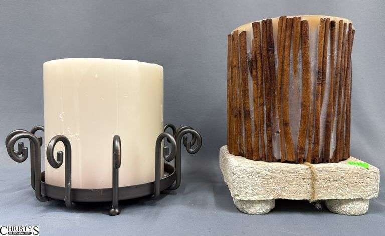 2 Large Candles With Holders, One is Partylite and One Has Cinnamon Sticks Around With Stone Base image