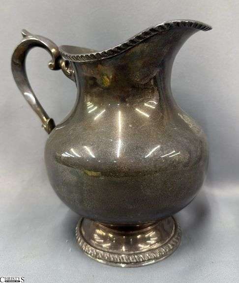 Electroplated Silver Pitcher Appears to Have a Lion Figure On Front 9" image