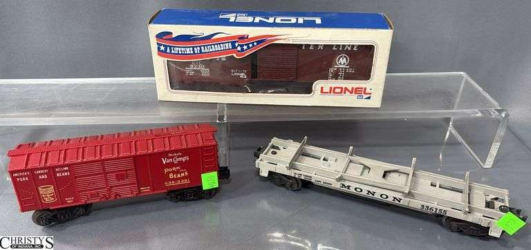 3 Lionel Train Cars, Monon 336155 Operating Flat Car, 9230 Boxcar, and Van Kamps Boxcar image