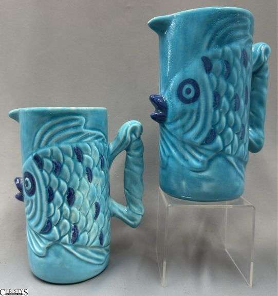 Pair of Turquoise Fish Motif Pottery Pitchers 8.5" image