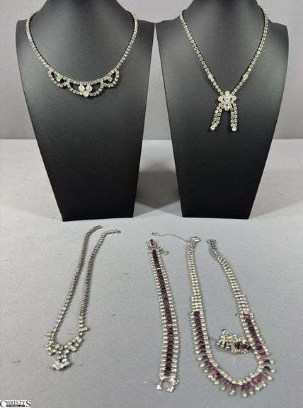4 Rhinestone Type Necklaces.  One necklace has  matching bracelet and earrings. image