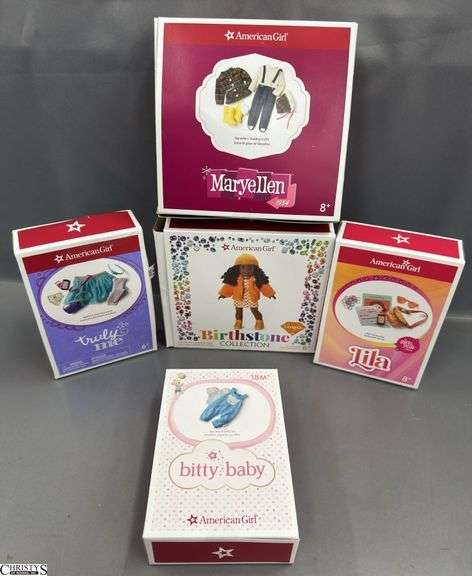 5 Boxes Of American Girl Clothing and Accessories, Birthstone Citrine, Mary Ellen 1954, Lila, Truly Me, Bitty Baby. Some missing pieces. Lila missing Fanny pack, birthstone missing orange jacket, image