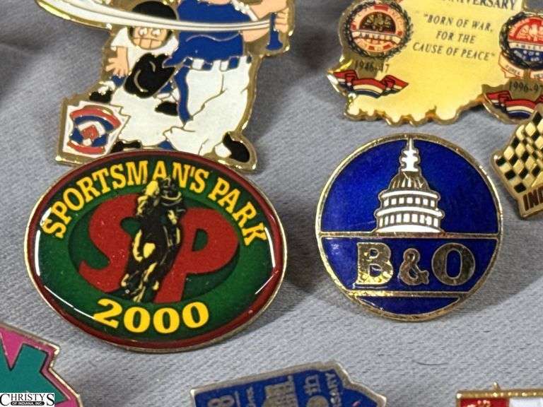 Miscellaneous Pins to Include Indy 500, Brickyard 400, 2 Vintage FMC Pins (Food Machine Co.), NCAA Basketball, Little League Baseball, Sportsman's Park 2000, Mello Yello Grand Prix, Indiana Amvets and Others