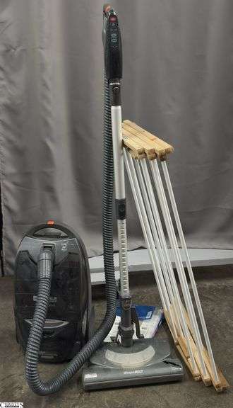 Kenmore Vacuum and Wood Drying Rack - Vacuum shows wear/damage image