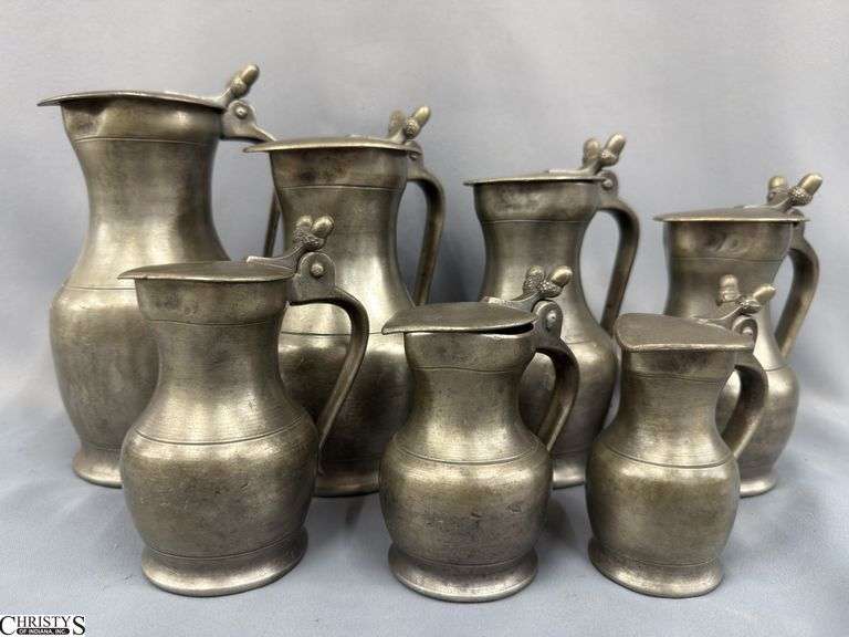 Set of 7 Pewter Flagons, Marked See Photos, Largest 10" To Top Acorn Thumb Lift image