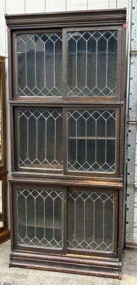 Antique Danner Leaded Glass Sliding Door Sectional Bookcase - 3pcs - 37" x 14.5" x 81.5" as sits - some finish wear, one glass panel is cracked image