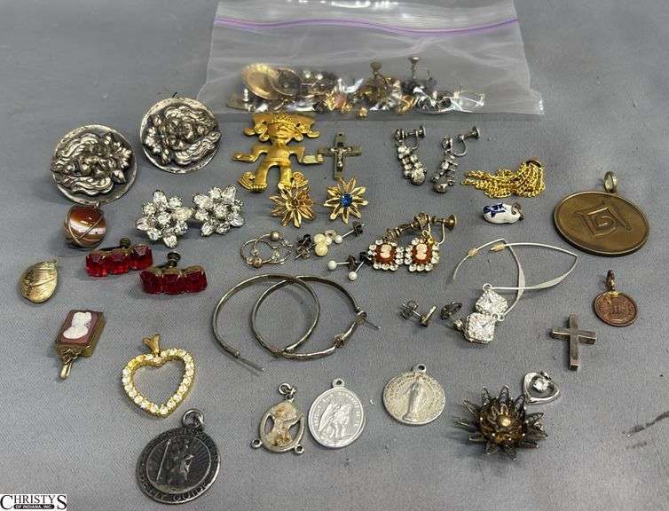 13 Pairs of Earrings, Single Earrings and 17 Pendants image