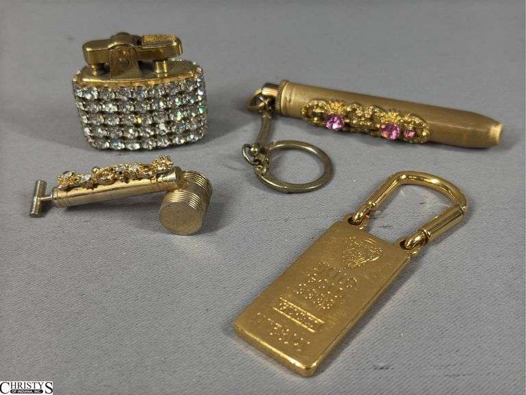 Gucci Gold Plated Key Chain, a Rhinestone Lighter, a Perfume Atomizer "Bug Spray" Pump Sprayer and another Piece with a Key Chain image