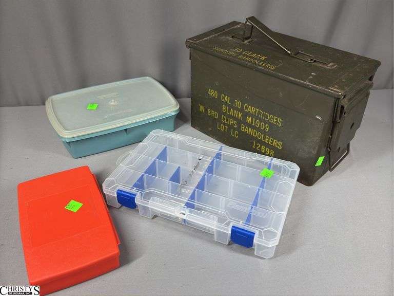 A Green Metal Ammo Can and 3 Plastic Organizers / Containers. image