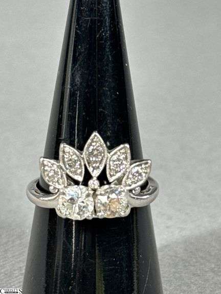 Platinum and Diamond Crown Shaped Ring.  Seller believes them to be 1/2 carat diamonds and 1/3 carat smaller diamonds. image