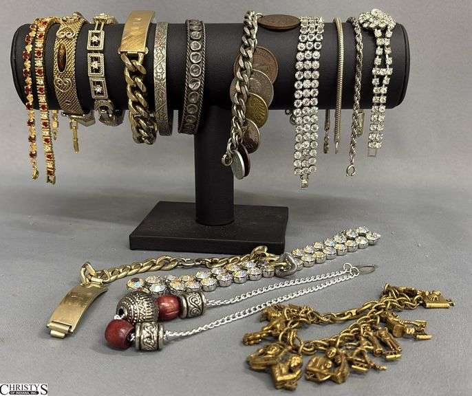 16 Bracelets Including a Coin Bracelet image