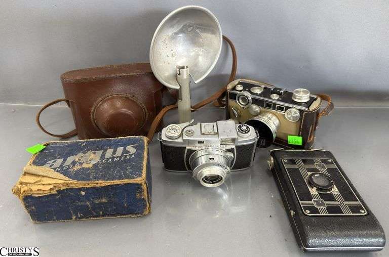 4 Vintage Cameras and 2 Flashes - Argus, Century, and Others image