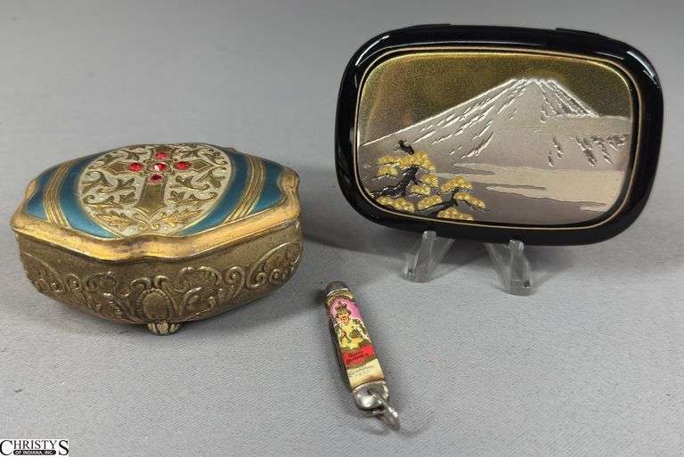 A Pocket Mirror Marked Japan, a Small Jewelry Box with Red Stones on Top and a Tiny Queen Elizabeth II Coronation 1953 Pocket Knife image
