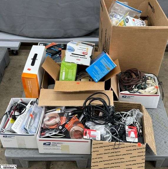 SKID with Lightbulbs, Extension Cords, Speaker Wires, Cordless Phones, Phone Cords, Wireless Gateway image