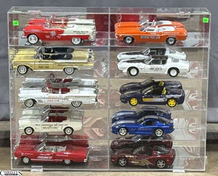 10 Indianapolis 500 Die Cast Pace Car Models in Plastic Display Case - Ertl, Greenlight, Road Signature and Others - 29" x 24" of case - 12" of largest car - some wear to the case, several cars need pieces reattched image