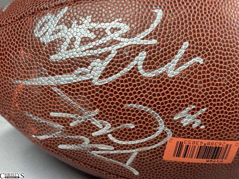 Wilson NFL Official Size Autographed Football.  Autographed include Reggie Wayne, Dallas Clark, Robert Mathis and Others.