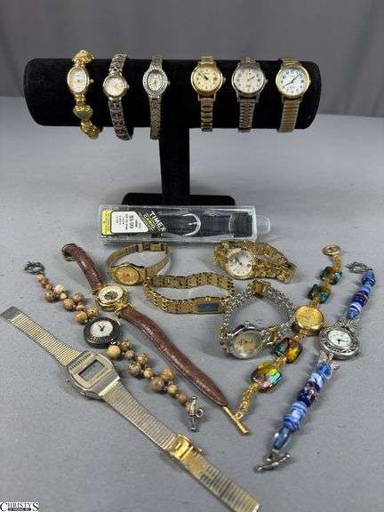 15 Wrist Watches and a Timex Black Replacement Band. image