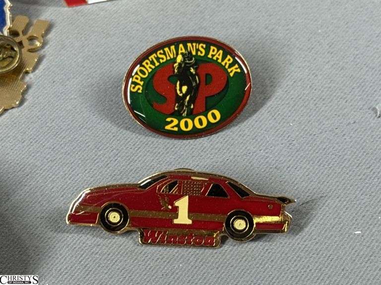Miscellaneous Pins to Include Indy 500, Brickyard 400, 2 Vintage FMC Pins (Food Machine Co.), NCAA Basketball, Little League Baseball, Sportsman's Park 2000, Mello Yello Grand Prix, Indiana Amvets and Others