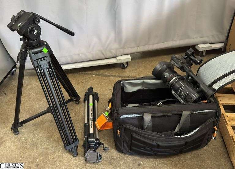 Panasonic AVC Cam Untested with Tripods, and Accessories in Bag image