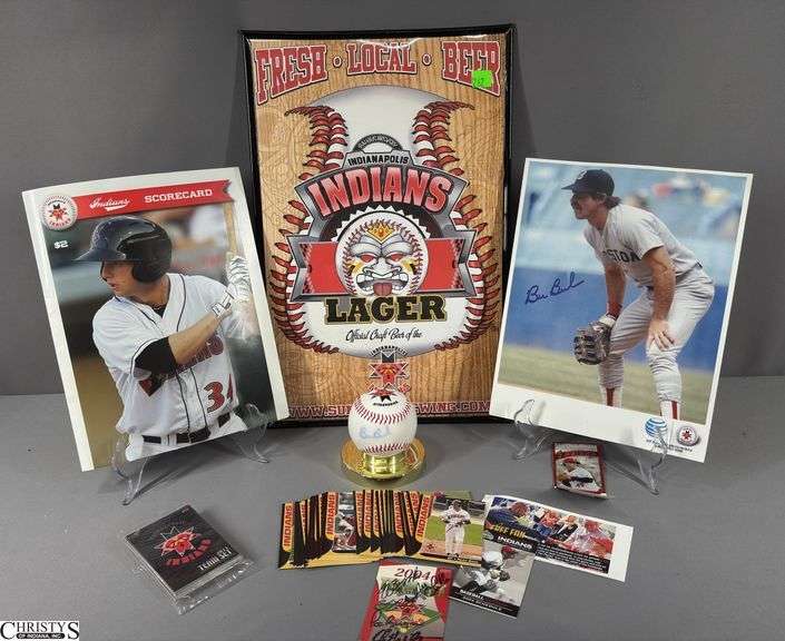 Indianapolis Indians Baseball Memorabilia.  Includes Trading Cards, Indians Scorecard, 11x17 Lager Poster, Bill Buckner Autographed Indians Ball and Photograph image