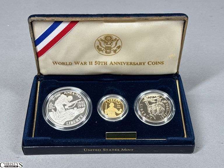 World War II 50th Anniversary Commemorative Three-Coin Set in Box.  Includes a Proof Gold Five Dollar, Silver Dollar and Clad Half Dollar image