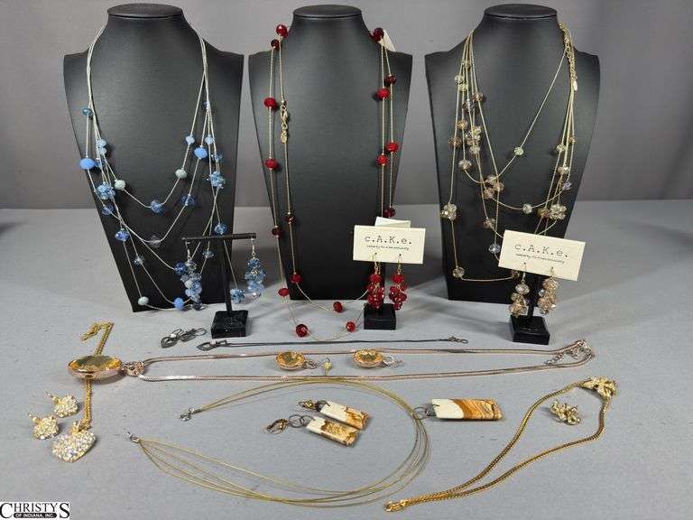 8 Matching Necklace and Earrings Sets.  One of the necklaces has a broken clasp. image