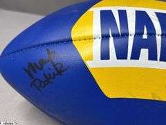 3 Footballs- One Blue NAPA Auto Parts and 2 Wilson National Football League.  One Wilson has autographed but they are fading and can not be read.  The other Wilson ball is in a display case.