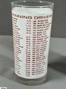 Indianapolis Memorial Day Classic 1967 Turbine-Powered Parnelli Jones Autographed Glass and a 7 UP Souvenir Bottle 500 Mile Race May 27, 1979 Autographed