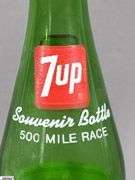 Indianapolis Memorial Day Classic 1967 Turbine-Powered Parnelli Jones Autographed Glass and a 7 UP Souvenir Bottle 500 Mile Race May 27, 1979 Autographed
