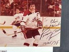 57 Indianapolis Racers Snapshots.  Mid 1970's.  Some are autographed.  Also included are Bill Estes Chevrolet Hockey Player Autographed Photos