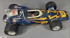 #2 Johnny Lightning Porcelain Lionstone Decanter Autographed by Al Unser and Parnelli Jones.  EMPTY