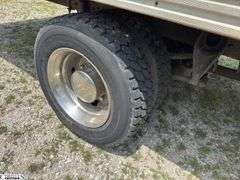 1999  INTERNATIONAL  4700 24' Box • Lift Gate Operating • Driven Here